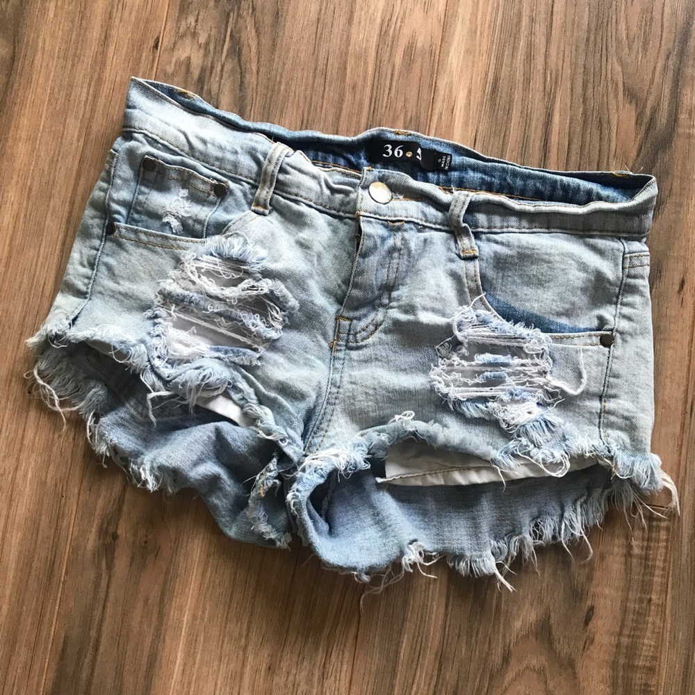 Distressed denim booty shorts light jeans